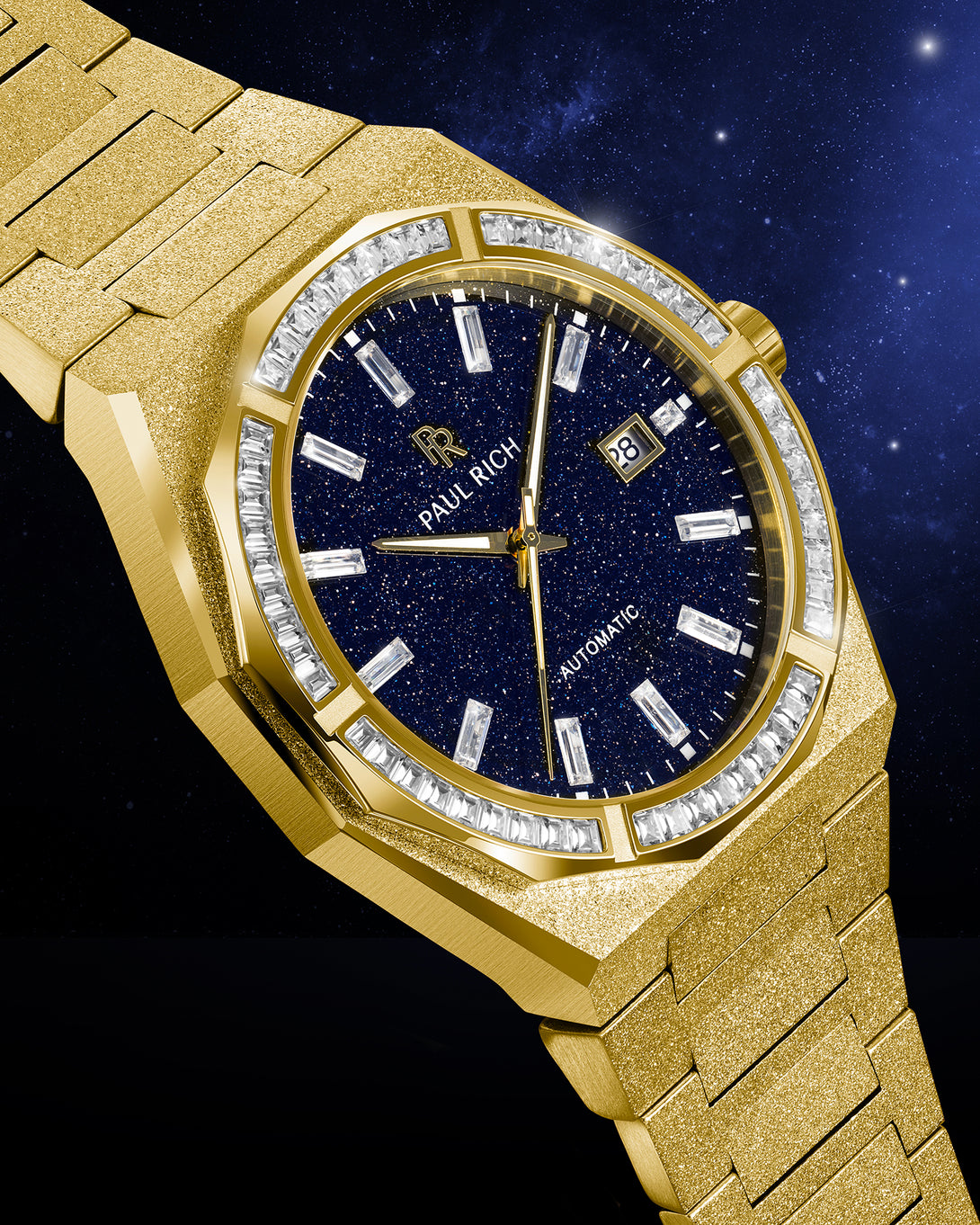 Gold frosted watch with blue aventurine dial and moissanite bezel displayed at an angle against a starry night sky background. Quartz | Automatic product_visual Gold frosted watch with blue aventurine dial and moissanite bezel displayed at an angle against a starry night sky background. Quartz | Automatic product_visual