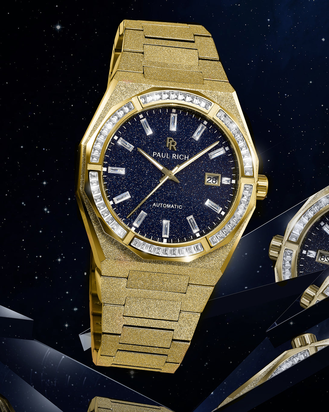 Gold frosted watch with blue aventurine dial and moissanite bezel shown against a starry background with mirrored reflections. Quartz | Automatic product_visual Gold frosted watch with blue aventurine dial and moissanite bezel shown against a starry background with mirrored reflections. Quartz | Automatic product_visual