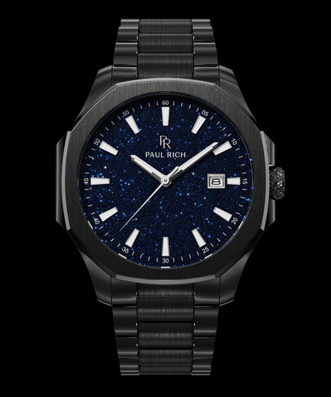 Mercer Gotham - Aventurine Blue Front view of Paul Rich watch with brushed black case and bracelet, blue aventurine dial, silver indices, and date window at 3 o’clock.