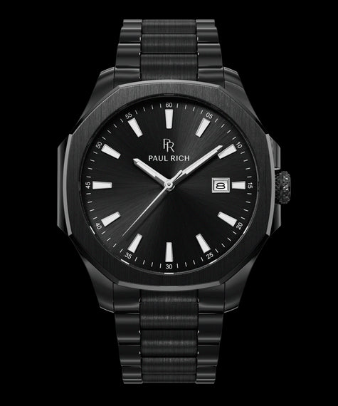 Mercer - Gotham Front view of Paul Rich watch with black sunray dial, silver indices, date window at 3 o’clock, and brushed black metal bracelet.