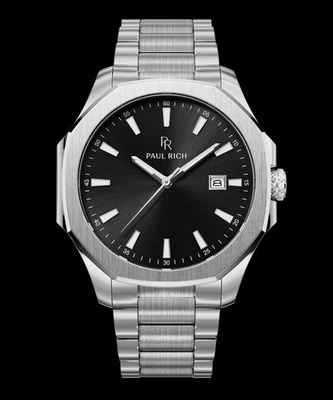 Mercer - Astor Front view of Paul Rich watch with black sunray dial, silver indices, date window at 3 o'clock, and brushed silver bracelet.