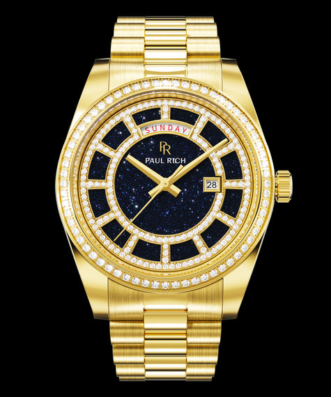 Crown Legacy Gold - Aventurine Blue Gold watch with a blue aventurine dial, day and date windows, and a bezel and hour markers set with clear stones on a full gold bracelet.