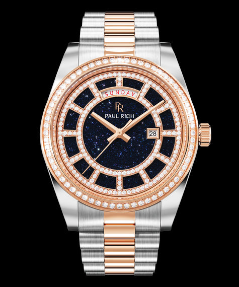 Crown Legacy Silver Rose Gold - Aventurine Blue Two-tone silver and rose-gold watch with a blue aventurine dial, day and date windows, and a bezel and hour markers set with crystal stones.