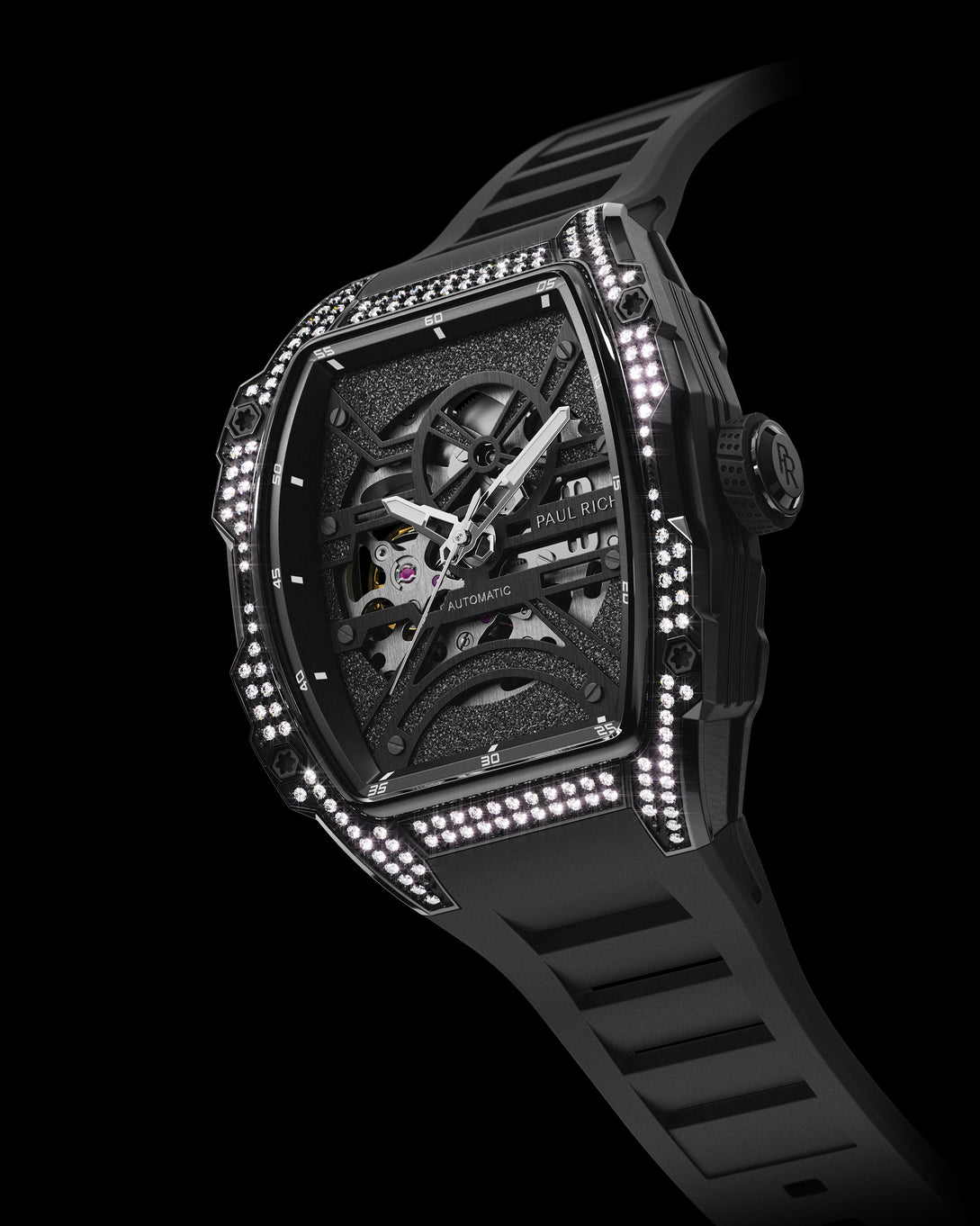 Angled view of black open dial luxury watch with silver movement, diamond-set black case, and black strap on black background. Angled view of black open dial luxury watch with silver movement, diamond-set black case, and black strap on black background.