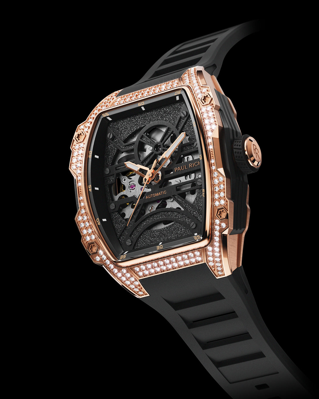 Angled view of luxury skeleton watch with rose gold diamond case, black dial, and black strap on white background. Angled view of luxury skeleton watch with rose gold diamond case, black dial, and black strap on white background.