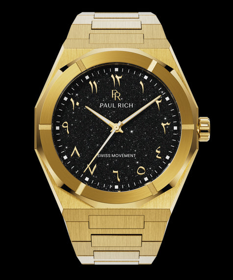 Star Dust II Obsidian Desert Gold watch with brushed case, black aventurine dial, and Arabic numerals, shown on a transparent background.
