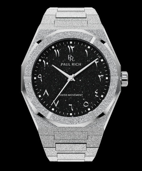 Frosted Star Dust II Shadow Oasis Silver watch with shimmering frosted case, black aventurine dial, and Arabic numerals, displayed on transparent background.