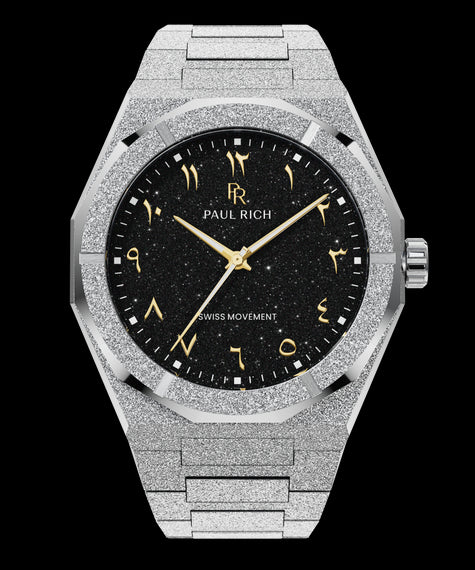 Frosted Star Dust II Gilded Mirage Paul Rich silver frosted watch with black aventurine dial, gold Eastern Arabic numerals, and Swiss movement.