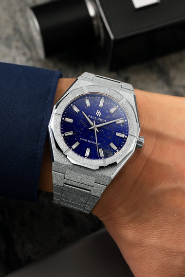 Silver Lapis Nebula watch with a blue dial on a wrist [product_visual] [lifestyle]