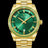 Gold watch with green sunray dial and green gemstone-set bezel on a gold bracelet, displaying the Paul Rich logo and date window.