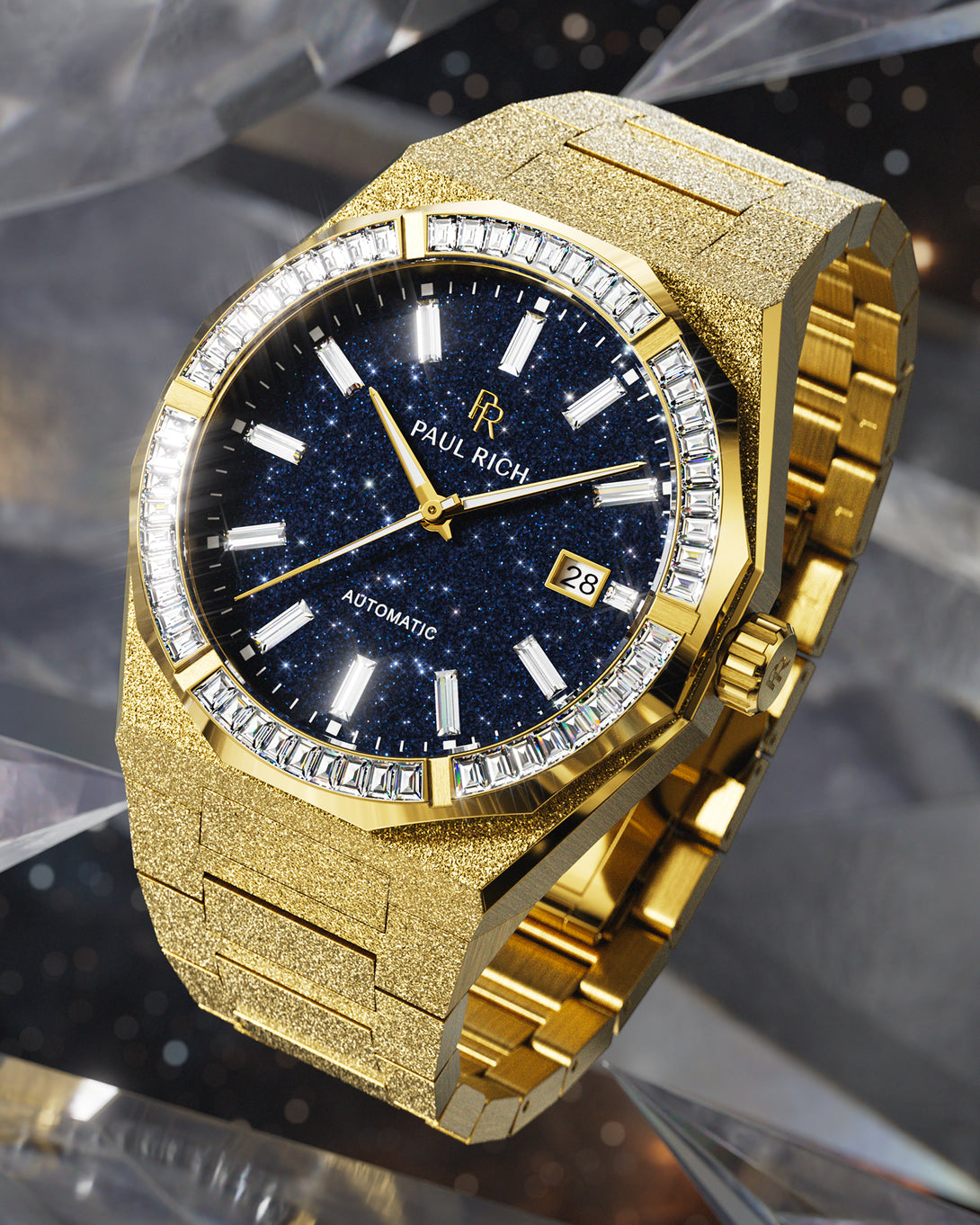 Gold automatic watch with a frosted case and bracelet, deep blue aventurine dial, and baguette-cut moissanite bezel on a crystal cosmic backdrop. product_visual, Quartz I Automatic