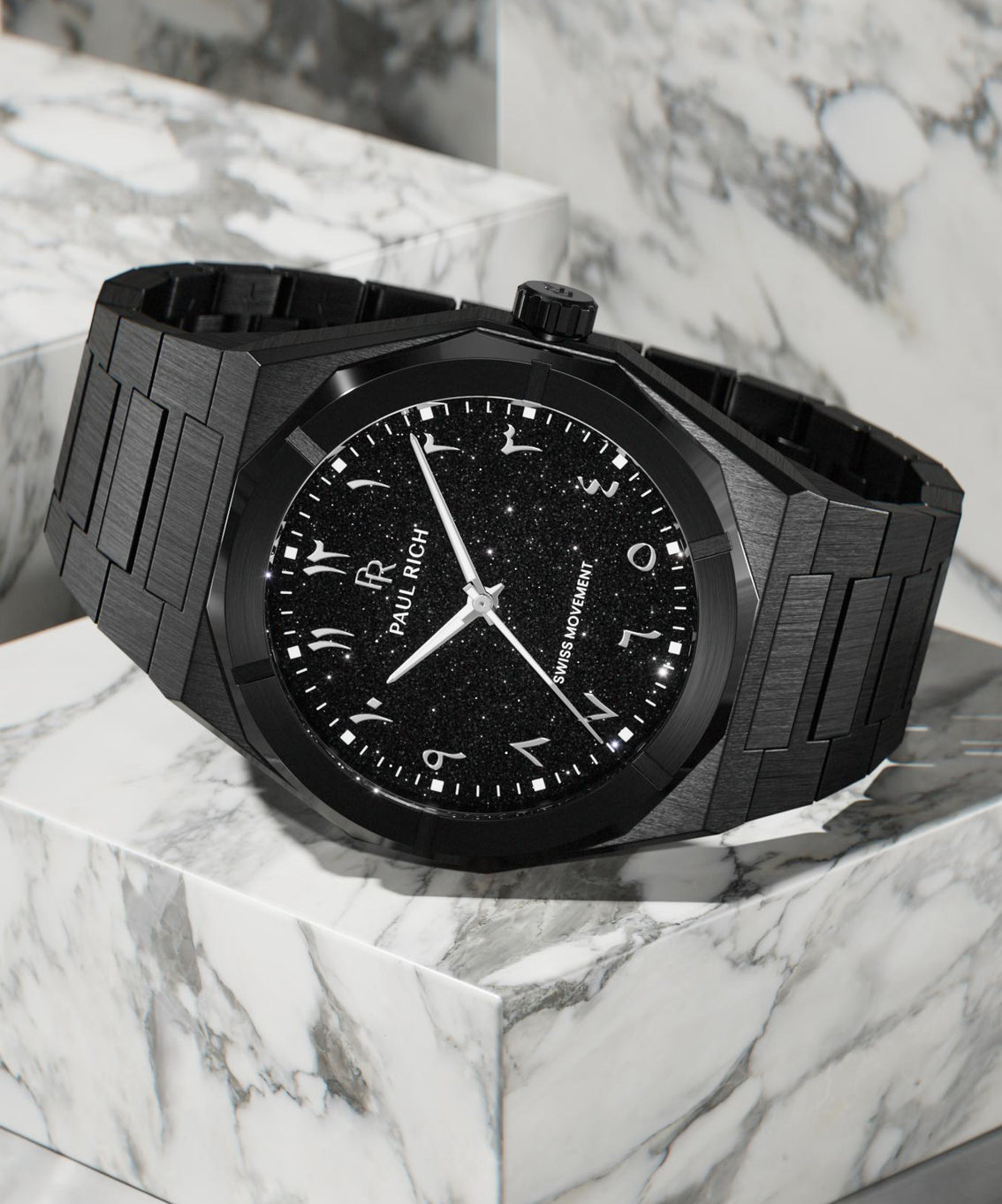 Paul Rich black brushed watch with black aventurine dial, silver Eastern Arabic numerals, and Swiss movement on black bracelet. product_visual