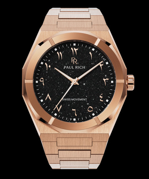 Rose gold watch with brushed finish, black aventurine dial, and Arabic numerals, displayed on transparent background.