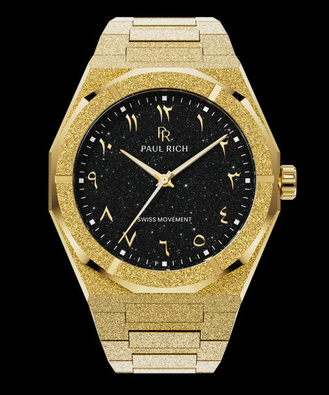 Paul Rich gold frosted watch with black aventurine dial, gold Eastern Arabic numerals, and Swiss movement on gold bracelet.