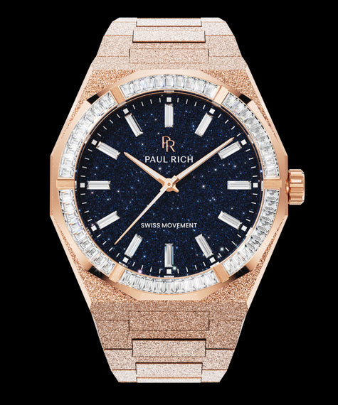 Rose gold frosted watch with blue aventurine dial and trapezoid-cut moissanite bezel reflecting light in sharp, diamond-like flashes. Quartz