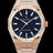 Rose gold frosted watch with blue aventurine dial and trapezoid-cut moissanite bezel reflecting light in sharp, diamond-like flashes. Quartz