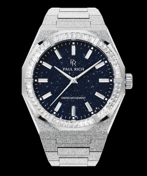 Silver frosted watch with blue aventurine dial and trapezoid-cut moissanite bezel, reflecting crisp white light across its polished surface. Quartz