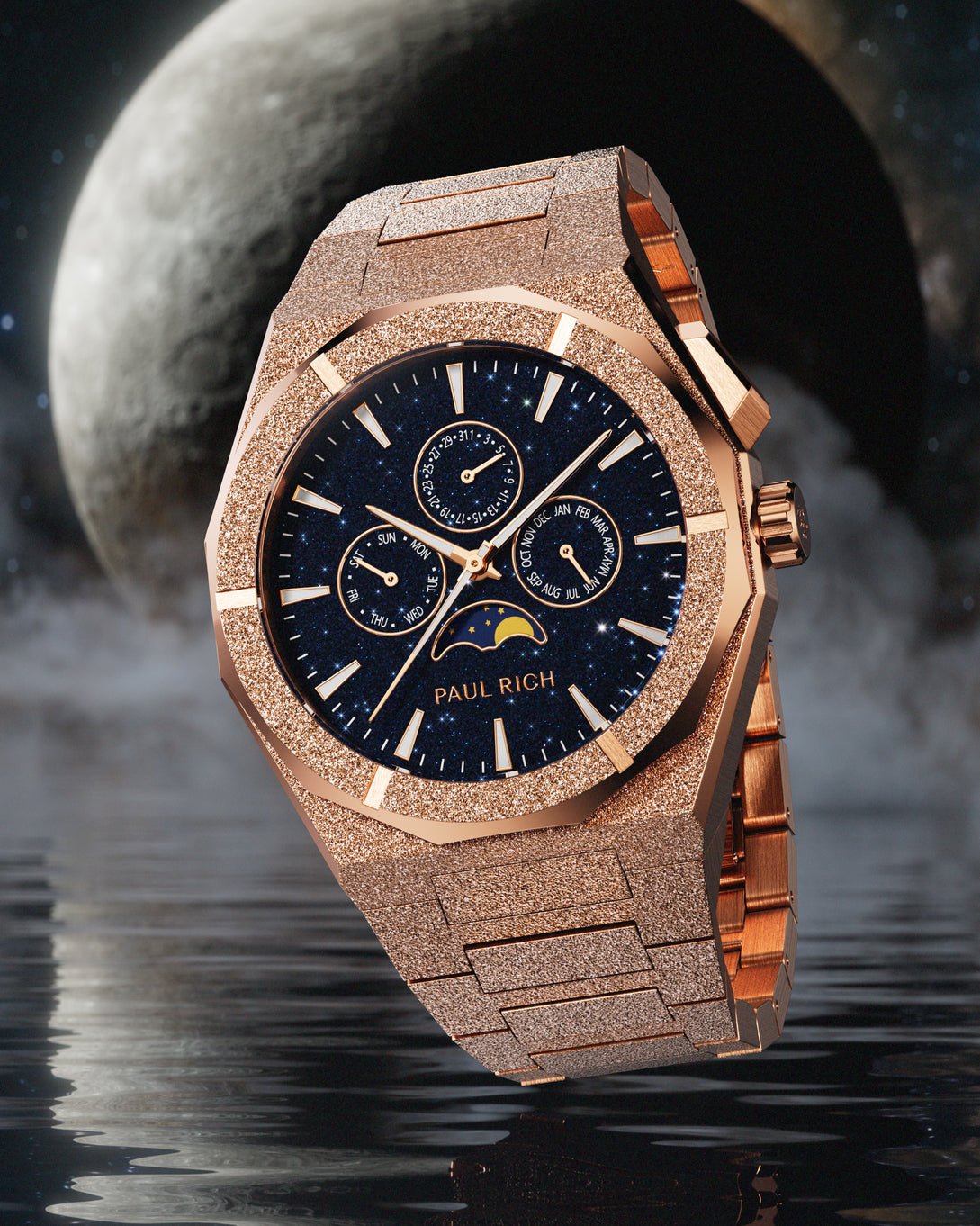 Frosted rose gold-tone stainless steel watch with blue aventurine dial, moonphase, and subdials, set against a dramatic moonlit water scene. product_visual