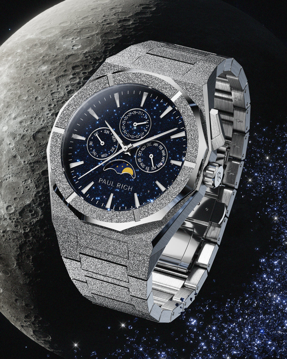 Frosted silver stainless steel watch with blue aventurine dial, moonphase, and subdials, set against a detailed lunar surface and starry space backdrop. product_visual