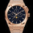Paul Rich rose gold watch with blue aventurine dial, moonphase display, and three subdials on a brushed bracelet.