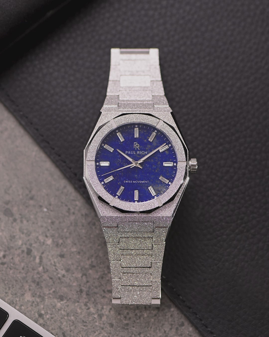 Frosted Star Dust II Lapis Nebula Silver worn on the wrist, natural light